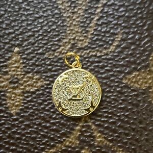 Beautiful Dainty Upcycled Louis Vuitton Gold and Rhinestone charm or pendant